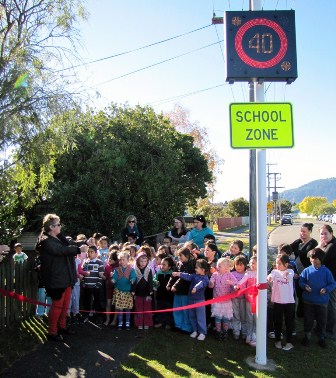 Carmel shows kids what to tell parents when approaching school zones.